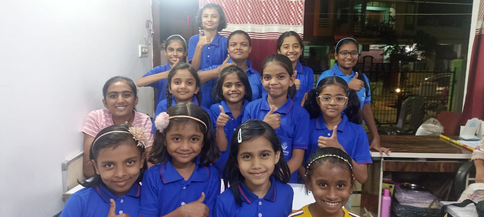 Children learning abacus in classroom